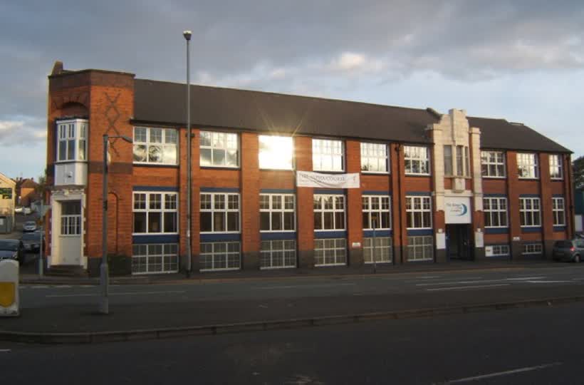 The Kings Centre, Wigston, Leicestershire, seen from the west.An Evangelical church and community centre established in 2001 in a former hosiery factory., close to the Aldi on Bull Head Street, Wigston