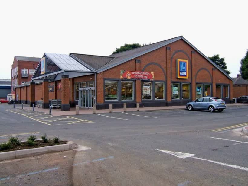 Aldi Supermarket, Green Street The two things Kidderminster isn't short of are pubs and supermarkets. Increasingly the design of supermarkets seems often to superficially resemble that of modern churches and this Aldi supermarket is no exception. With the price of food going through the roof, many more people are using the cheap discounters like Aldi, Lidl and Netto. You might not think that this was so seeing the near empty car park, but the photo was taken on a Sunday morning before opening time!, close to the Aldi on Green Street, Kidderminster