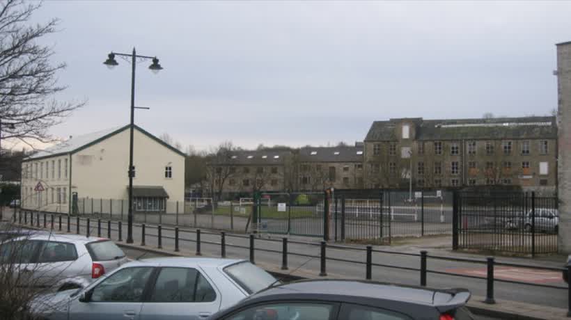 Site for new Aldi Supermarket in Ramsbottom This is the site for the new £5M Aldi supermarket due to be built on Railway Street in Ramsbottom during 2009. The white building on the left used to be offices of the distribution company TNT with the staff car park located on the right. Controversial plans to build a third supermarket in Ramsbottom were originally rejected by Bury Council on design issues in August 2008. Aldi appealed against that decision and won in December 2008 with construction due to begin in March 2009.http://www.burytimes.co.uk/news/ramsbottomtottington/4007643.Aldi_to_open_new_store/ The plans to develop a third supermarket, joining Tesco and the Co-op, have infuriated somee local traders. Janet Hodgson, who has runs The Flower Gallery in Bridge Street said in the local press: I have nothing against the company but I feel very strongly that an Aldi store is the last thing Ramsbottom needs. Ive yet to meet a person in Ramsbottom who thinks its a good idea". Judith Morris of Turley Associates, acting for Aldi, also said in the local press "there had been a lot of consultation work and the store will have no direct impact on town centre trade". More photographs will be added from this location as construction progresses during 2009, close to the Aldi on Railway Street, Bury