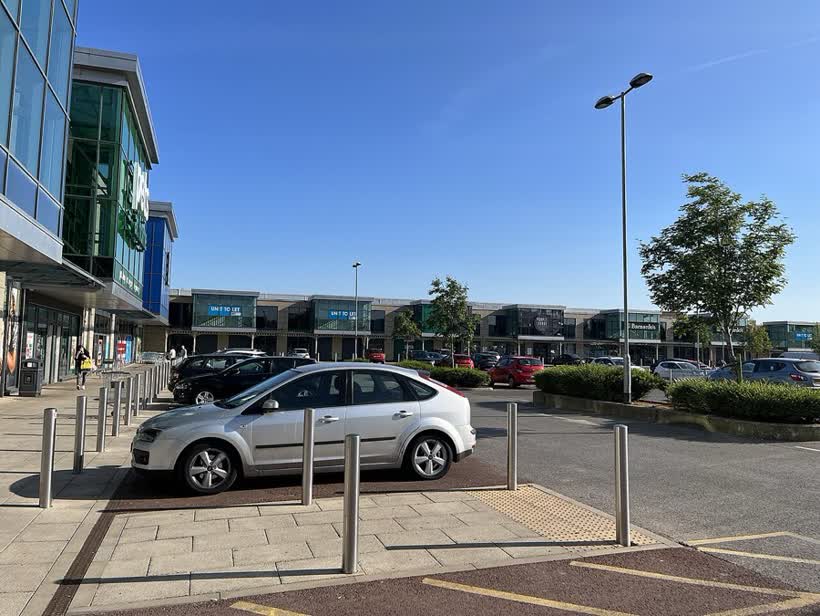 Showing cars parked outside shops at Walkden Town Centre retail park., close to the Aldi on New Ellesmere Approach, Walkden