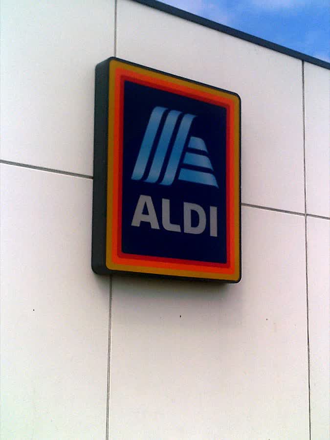 Aldi sign on the wall at Aldi Superstore, Oulton Broad, close to the Aldi on Millennium Way, Lowestoft