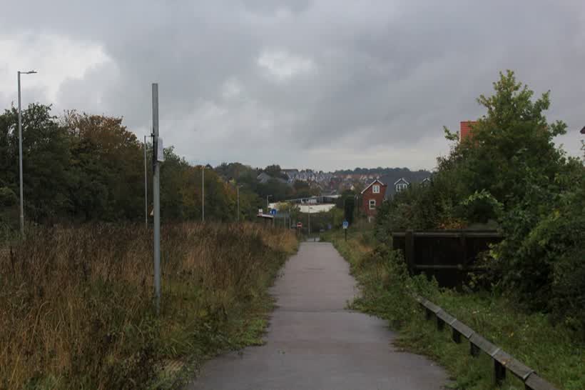 Pavement beside Thaxted Road at Knights Park, close to the Aldi on Knight Park, Saffron Walden