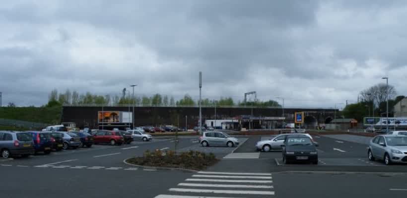 Aldi car park The store was recently completely rebuilt and the car park improved. The blanked off viaduct in the distance carries the Glasgow Central to Ayrshire railway lines., close to the Aldi on Fulbar Road, Paisley