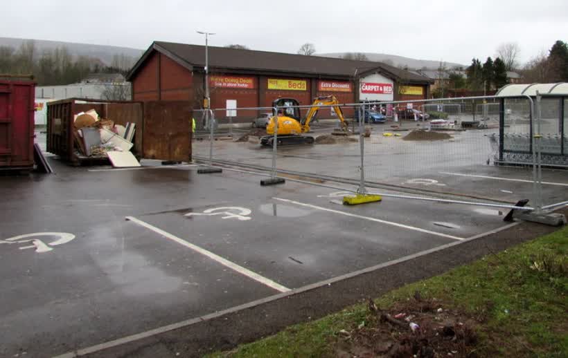 Temporary fencing at the edge of Aldi, Cwmbran, close to the Aldi on Woodside Road, Cwmbran
