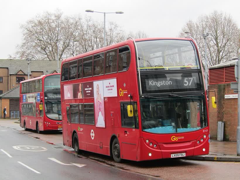 This busy local transport hub in SW London takes its name from the adjacent park. Red London buses are a familiar sight here e.g. this double-decker on Route 57., close to the Aldi on Fairfield West, Kingston upon Thames