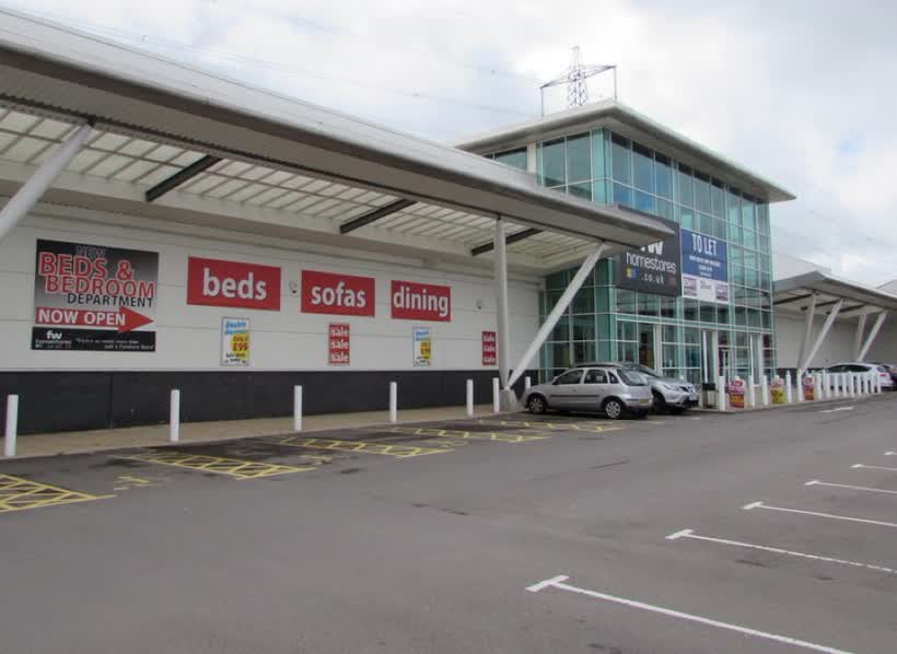 This way to the new beds & bedroom department, FW Homestores, Newport, close to the Aldi on NP20 2NW, Newport